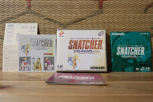 Snatcher con materiale - , di