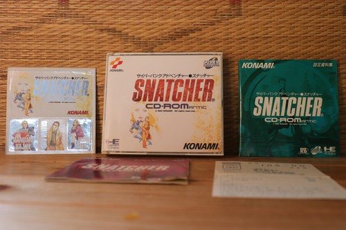 Snatcher con materiale - , di
